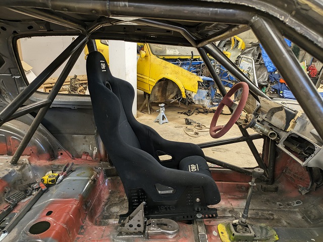 Fixation rail baquet 205